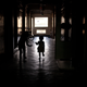 Children play in a corridor of the BDD chawl.